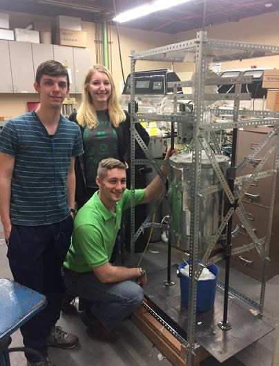 Team members with the designed system