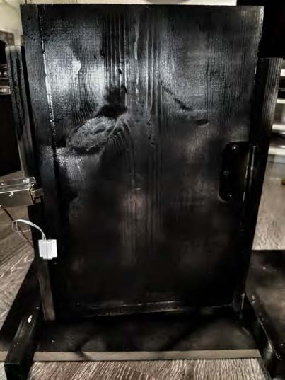 Image of a black door with the intelligent lock installed