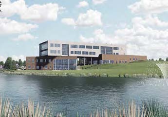 Image of one of the buildings by a lake
