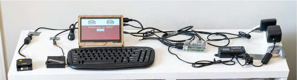 Photo of the system with keyboard and screen