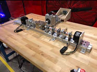 Photo of the project setup on a table with a fan connected