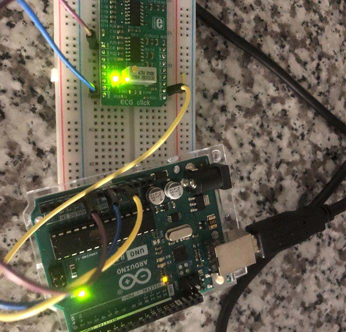 Photo of two electric circuit boards connected with wires