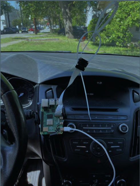Photo of a car interior where circuits connected to the roof