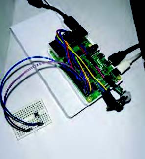 Image of a circuit board connected with a breadboard