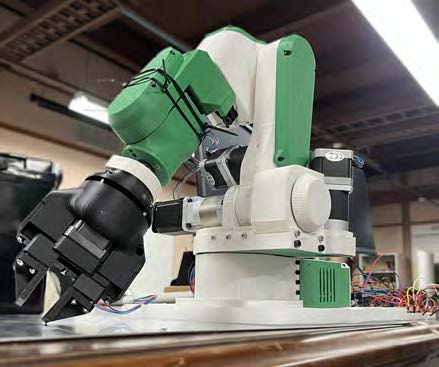 Photo of the robotic arm in green and white