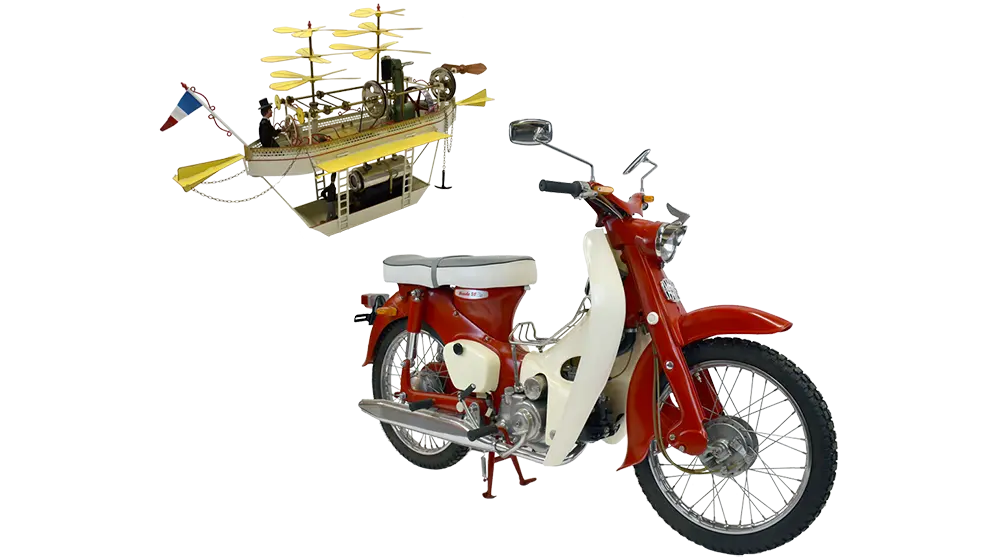A motorcycle and a model boat