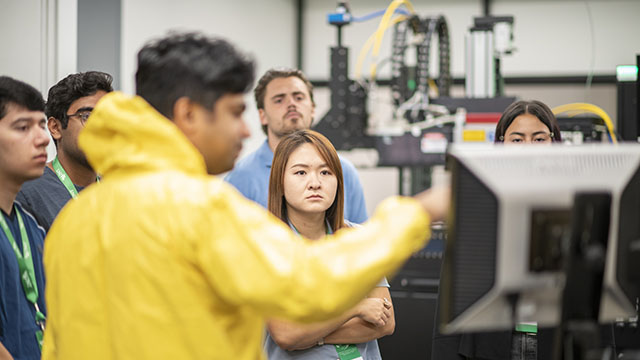 Students touring a research lab