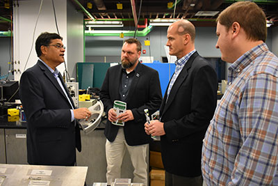 UNT faculty Rajiv Mishra with visitors