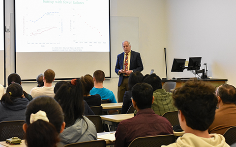 Steven Zinkle presents in front of faculty and students