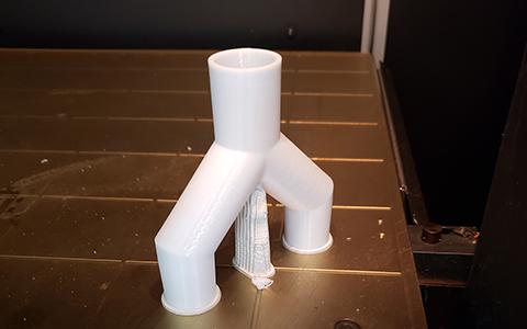 Photo features a splitter on a 3D printing tray