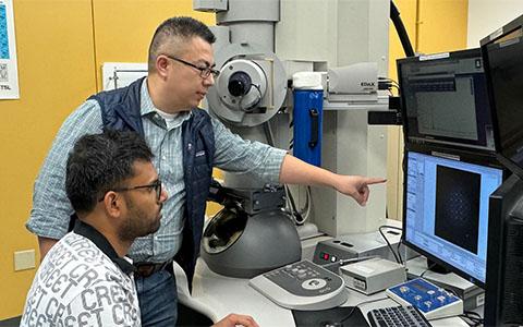 Dr. Yufeng Zheng and graduate student Deepak Pillai working in the UNT Materials Research Facility