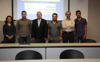 Congressman Burgess and Dr. Hassan Takabi with Ph.D. Students